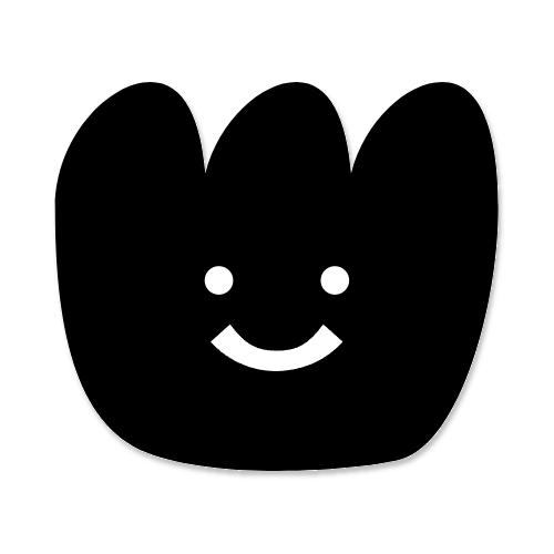 Mascotte noire et blanche Mü